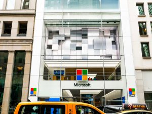 Street view of Microsoft's flagship store on 5th ave, Microsoft's Facade features oversize triple laminates.