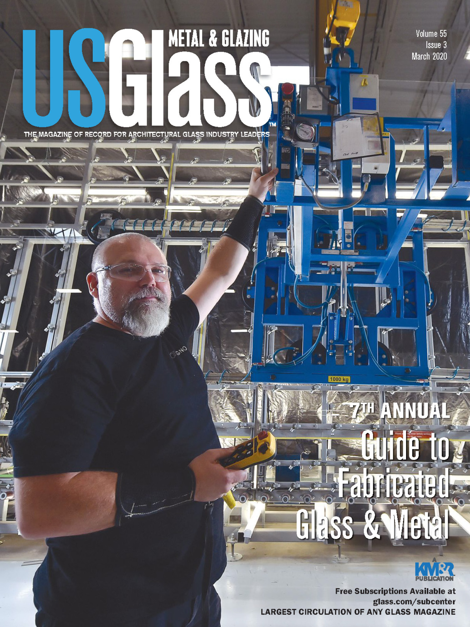Lee Wilson, Operator at AGNORA stands in front of lift device on the cover of US Glass Magazine
